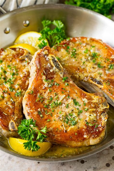They are so easy to make, super juicy, and flavorful. Baked Pork Chops with Garlic Butter - Dinner at the Zoo