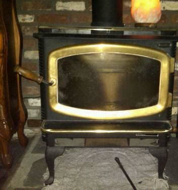 Find wooden screen doors today! Avalon wood stove with brass door trim for Sale in Durham ...