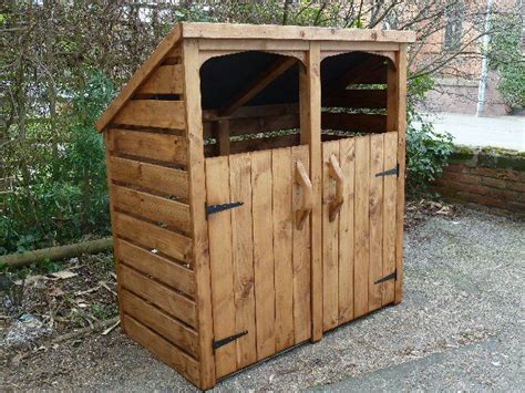 A shed or outdoor garbage can enclosure can combine the efficiency of general storage as well as an easy solution to disposing of your recycling, trash, paper, plastic. How to Build a Trash Shed | Healthy Home and Kitchen ...