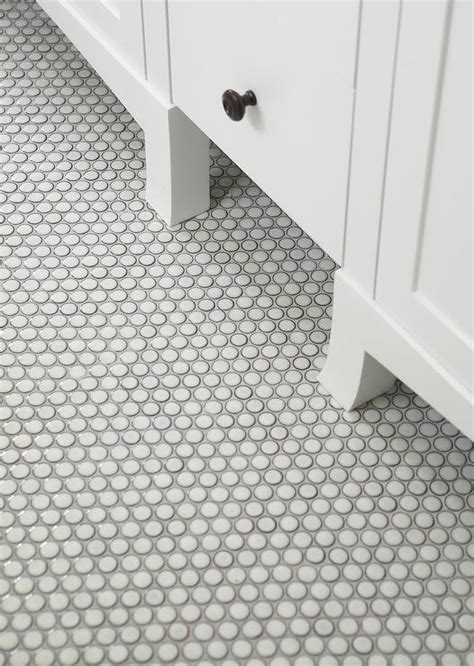 You can use them as for floors as for walls. White and Blue Powder Room with Blue Penny Tile Floor ...