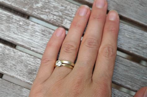 If you plan on getting an engraving on your ring's band, get it sized first. Why I Don't Wear My Engagement Ring | HuffPost