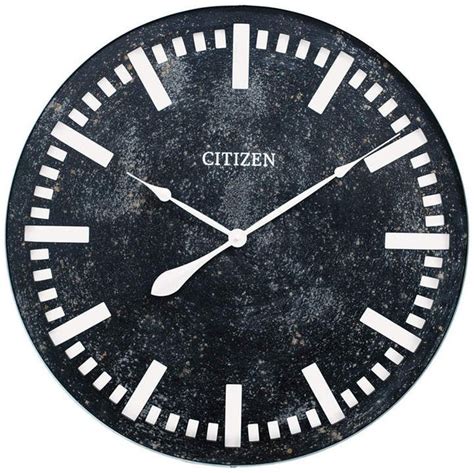 A Black And White Clock With Roman Numerals On Its Face That Reads Citizen
