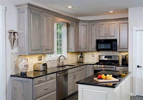 The cabinets frames and internal shelves remain the same, but you get brand new cabinet doors, hinges, handles, and fixtures. Gray Kitchens - Kitchen Cabinet Refacing | LFIKitchens