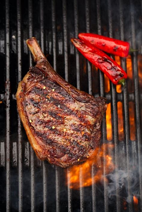 Food Meat Beef Steak On Bbq Barbecue Grill With Flame Stock Photo