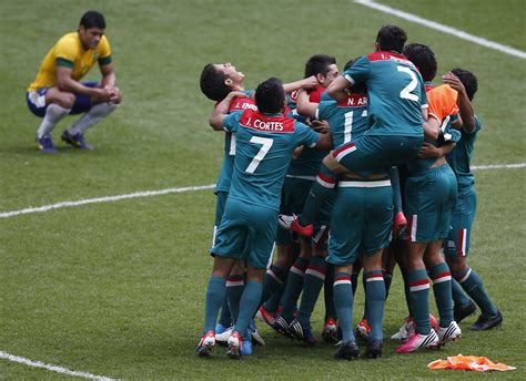 The victory in soccer secured the americans a bronze medal , and the victory in basketball clinched a berth in the gold medal game. Mexico's master plan produces soccer gold | Olympics ...