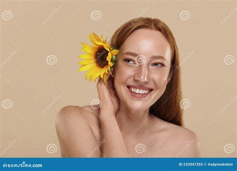 Redhead Girl With Naked Shoulders Holds Sunflower Stock Image Image