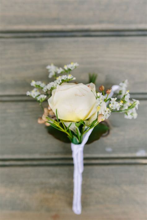 Classic White Rose And Babys Breath Boutonniere