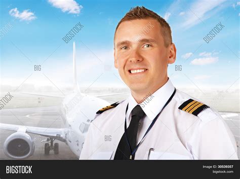 Airline Pilot Wearing Image And Photo Free Trial Bigstock