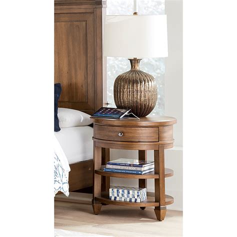 These nightstands are perfect for rooms that are tight on space. Thornton Transitional Round Table Nightstand with Two ...