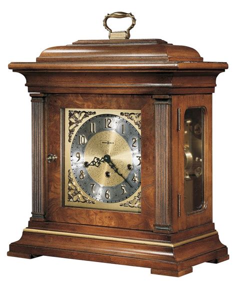 An Antique Wooden Clock With Roman Numerals On The Face And Hands Set