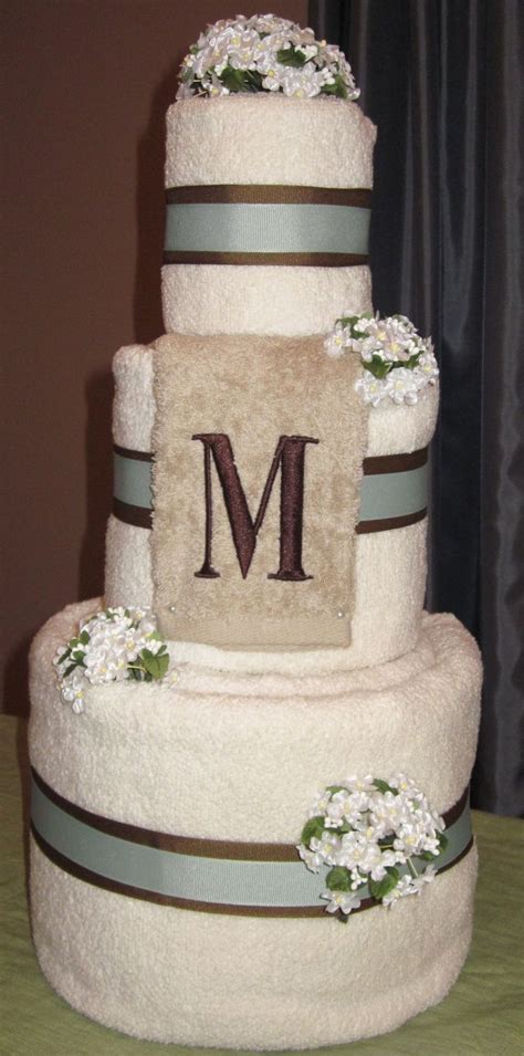 Unfortunately neither her blog nor the site that link went to still exist. 105 best images about Towel cakes on Pinterest | Wedding ...
