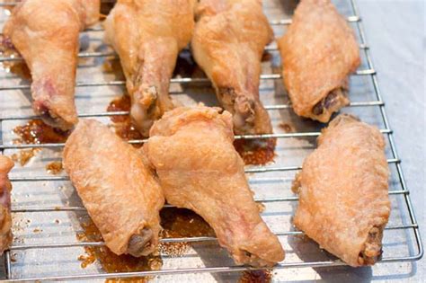 Prepare a baking sheet with a wire rack. cornstarch fried chicken wings