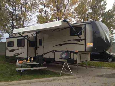 Maybe you would like to learn more about one of these? 2014 Used Forest River WILDWOOD HERITAGE GLEN 300BH LITE ...