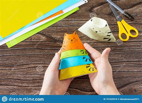 Origami Toy Made From Paper Puppets Cat Glue Scissors And Paper On A