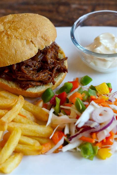 De Lekkerste Pulled Pork Uit De Slowcooker Pulled Pork Slow Cooker