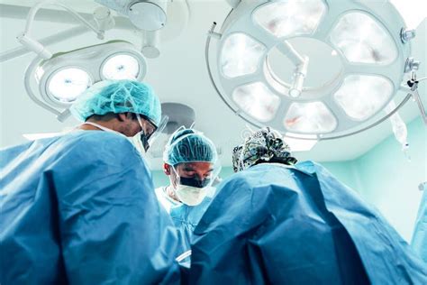Team Of Surgeons Operating Stock Image Image Of Occupation 121734901