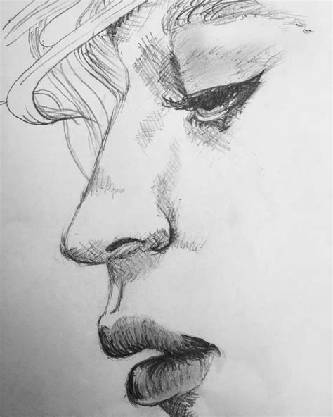 A Pencil Drawing Of A Mans Face