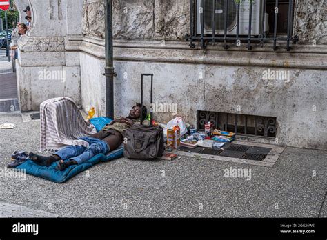 ROME ITALY UK 28 August 2021 A Homeless Man Sleeps Half Naked In A