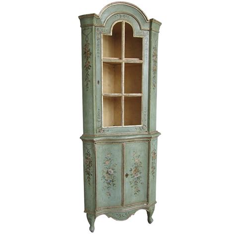 An rustic antique pine corner cupboard. Antique Italian Painted Corner Cabinet For Sale at 1stdibs