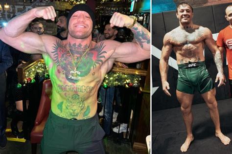 conor mcgregor poses shirtless in crumlin pub wearing custom gold chain