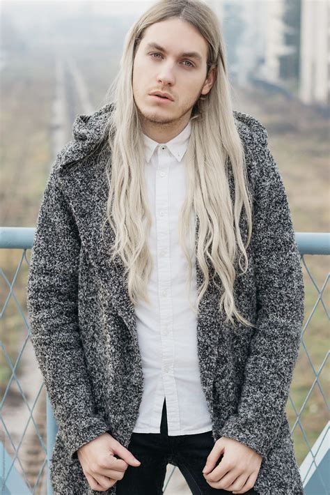 Handsome Male Model With Long Blond Hair Del Colaborador De Stocksy