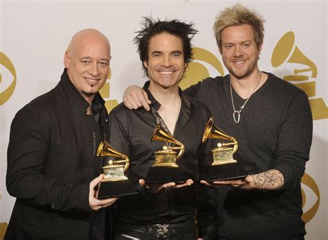 Train with their Grammys for "Hey, Soul Sister" at the 2011 Grammy