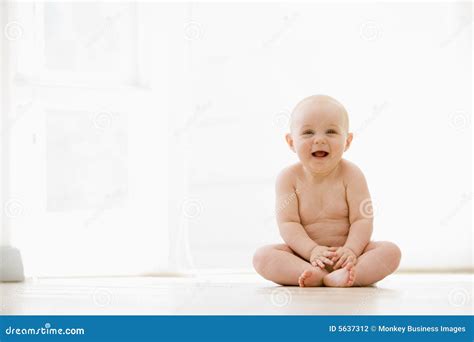 Baby Sitting Indoors Smiling Stock Photo Image Of Daytime Adorable