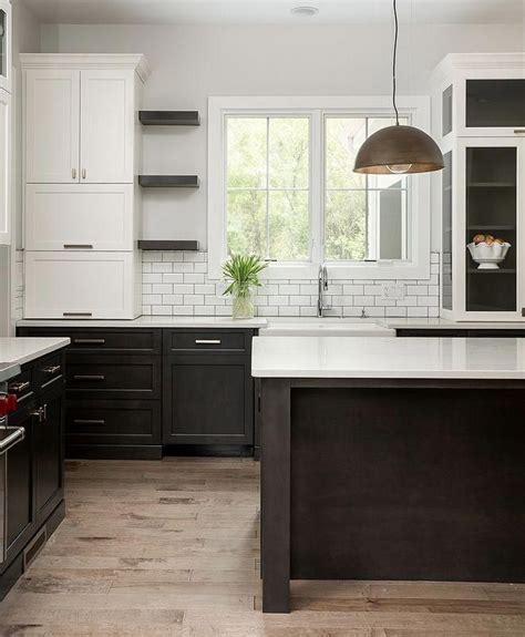 Two Tone Kitchen With White Top Cabinets And Dark Stained Bottom