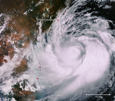 Image captiona woman cycles through heavy rain as cyclone amphan approaches kolkata. Monster Cyclone Fani Over India Looked Fearsome from Space ...