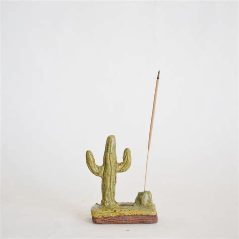 The scent that comes from incense often lingers longer than candles, is more safe to light and forget about (since it burns out in 45 minutes), and adds a comfortable, hygge touch to your decor. http://theshinysquirrel.tumblr.com/post/139522451108 | Diy incense holder, Cactus ceramic, Incense