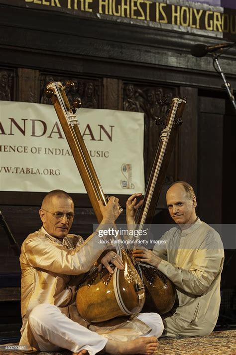 Tanpura Players David Taylor And Ted Morano Tune Their Instruments