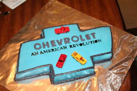 Chevy Bowtie Its White Cake With Cherry Perserve In Between The