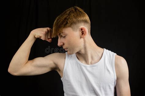 Teenage Boy Flexing His Bicep Stock Photo Image Of Workout Handsome