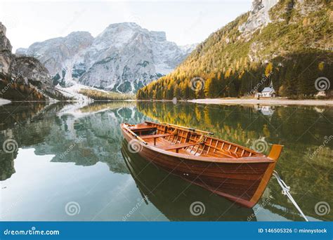 Traditional Rowing Boat At Lago Di Braies At Sunrise In Fall South