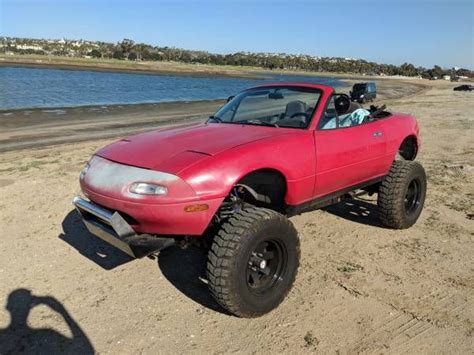 Yes Thats A Lifted Four Wheel Drive Mazda Miata Sitting On The