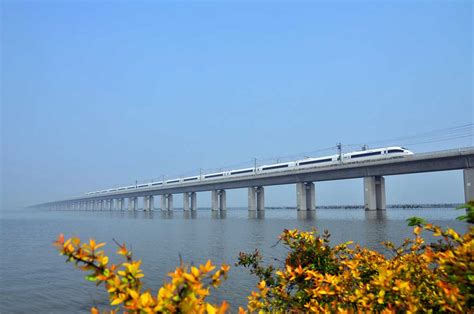 It crosses low rice paddies, part of the yangtze river delta, with just a few miles of the bridge actually crossing the open water of yangcheng lake in suzhou. World's Longest | Danyang Kunshan Grand Bridge ...