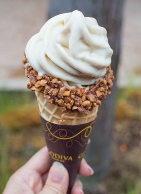 Grab a cone or a cup, some rich dark chocolate ice cream and top it with their crunchy chocolate this chocolate ice cream has a deep chocolate flavour and if you are a fan of godiva, you will love the ice cream too. Godiva's New Soft Serve Ice Cream - Kirbie's Cravings