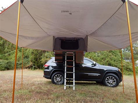 This Hard Shell Rooftop Tent Can Fit Up To 4 People