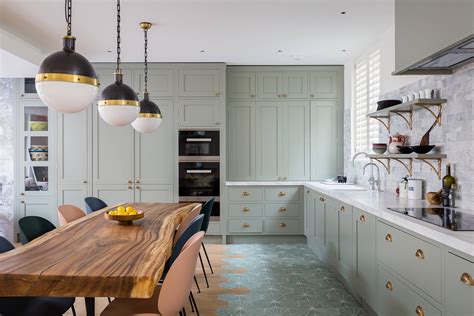 The black accent wall enhances the beautiful wood. 16 Beautiful Eclectic Kitchen Interior Designs That Will Dazzle You