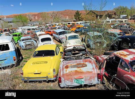 Scrap Yard Full Of Volkswagen Cars And Vans Near Moab Utah Usa Stock