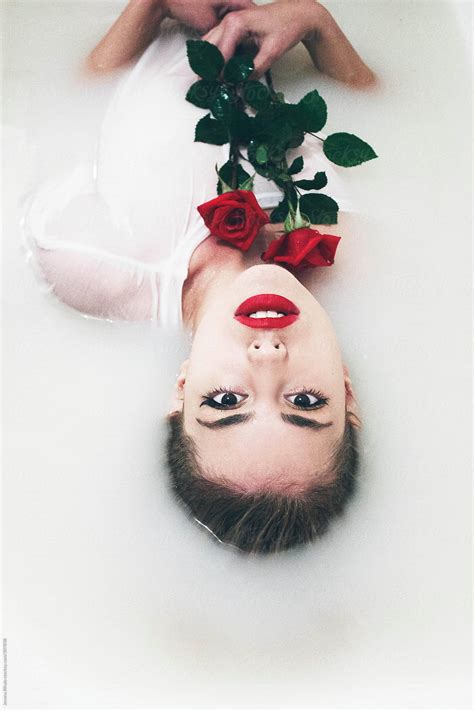 An Attractive Young Woman Lies In Milk Bath By Jovana Rikalo