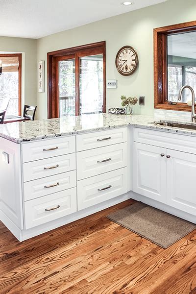 Call us at 636.579.6858 for kitchen and bathroom remodels, and even flooring and entry door installations. Signature Kitchen & Bath | Dura Supreme Kitchen in St. Louis