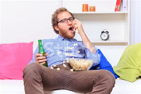 Man Eating Popcorn Stock Photo Royalty Free Freeimages