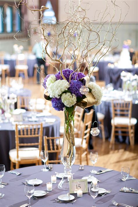 tall purple hydrangea centerpieces with branches wedding flower arrangements purple purple
