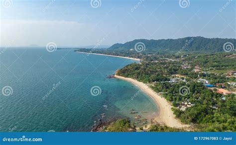 Aerial Drone View Of Tropical Beach From Above Sea Sand And Palm