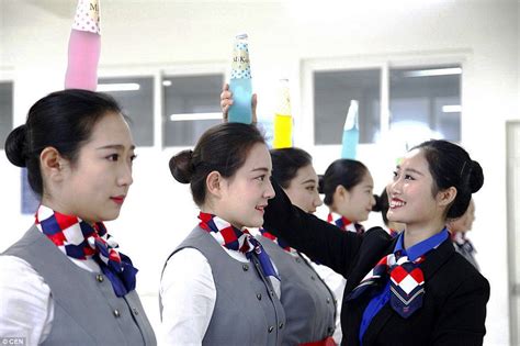 Chinese Flight Attendants Practise Graceful Grin With A Chopstick Between Their Teeth Daily