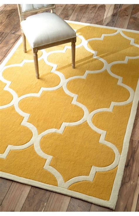 I had 'whites and brights' in my mind for our nursery and wanted either yellow and white curtains or a yellow and white rug. 25 Yellow Rug and Carpet Ideas to Brighten up Any Room