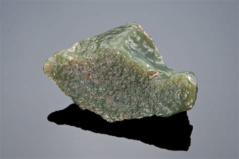 This Delicate Light Olive Nephrite Slick Is One That Is Desired By Both