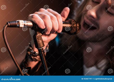 Young Male Singer With Microphone On Stage Stock Image Image Of
