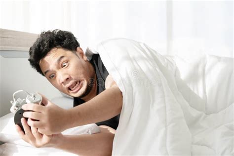 A Man With Shocked Face After Wake Up Late And Missed The Appointment Stock Image Image Of